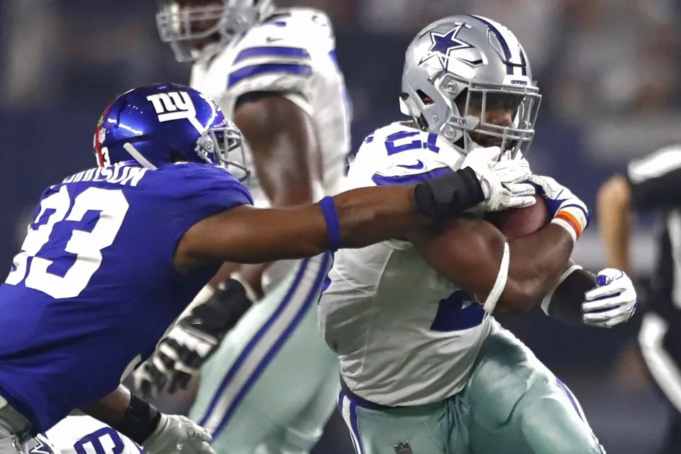 Ezekiel Elliott firma con los Patriots